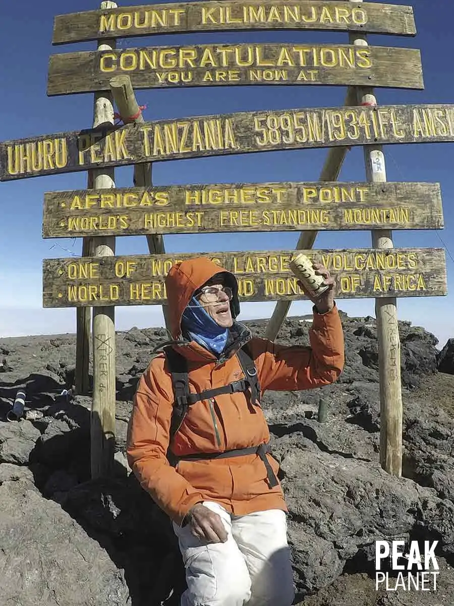 Dr Distelhorst drinking Coors Light on Kilimanjaro